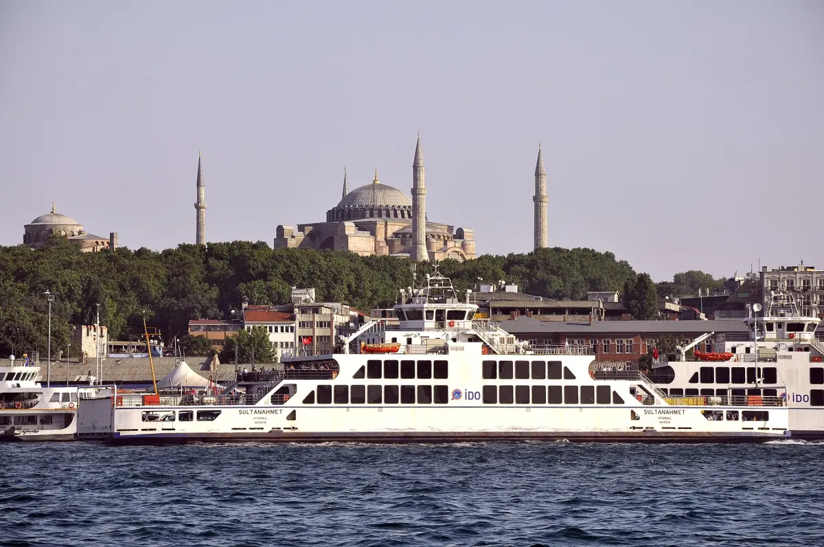 Ferry on the water with Hagia Sophia on the skyline